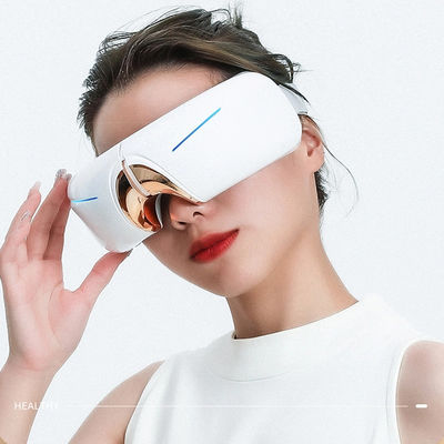 Machine de massage oculaire de beauté intelligente qui fait vibrer la pression de l'air et la personnalisation des résultats