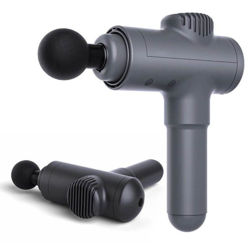 Un pistolet de massage à vibration à 4 têtes pratique pour la relaxation musculaire et la performance sportive